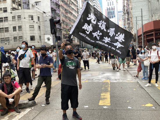 「光復香港 時代革命」のスローガンは毎回デモの現場で掲げられていた（5月24日、国案法反対デモより）